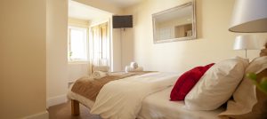 The master bedroom bathed in natural light
